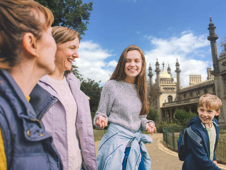 A family walking through the streets of Brighton