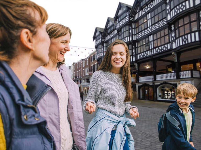 A family walking through the streets of Chester