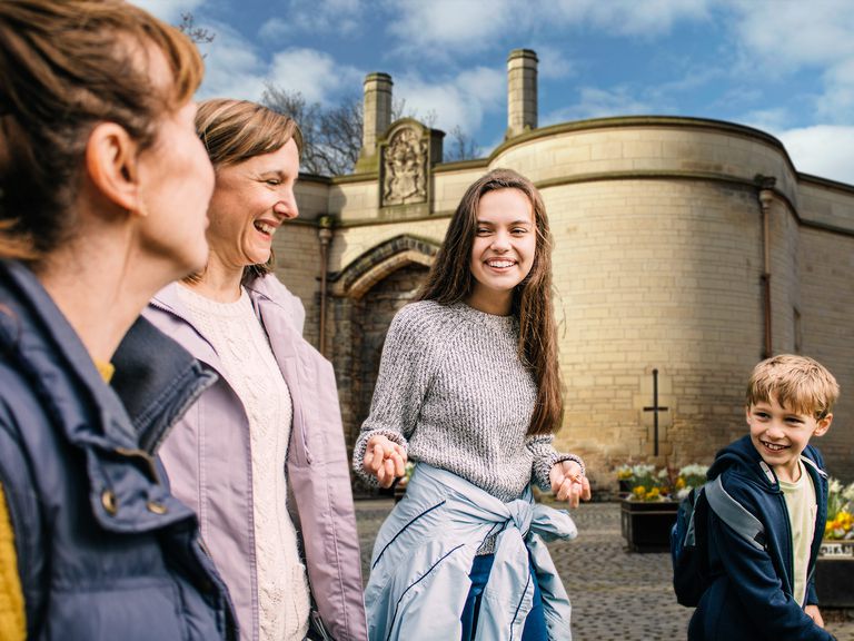 A family walking through the streets of Nottingham