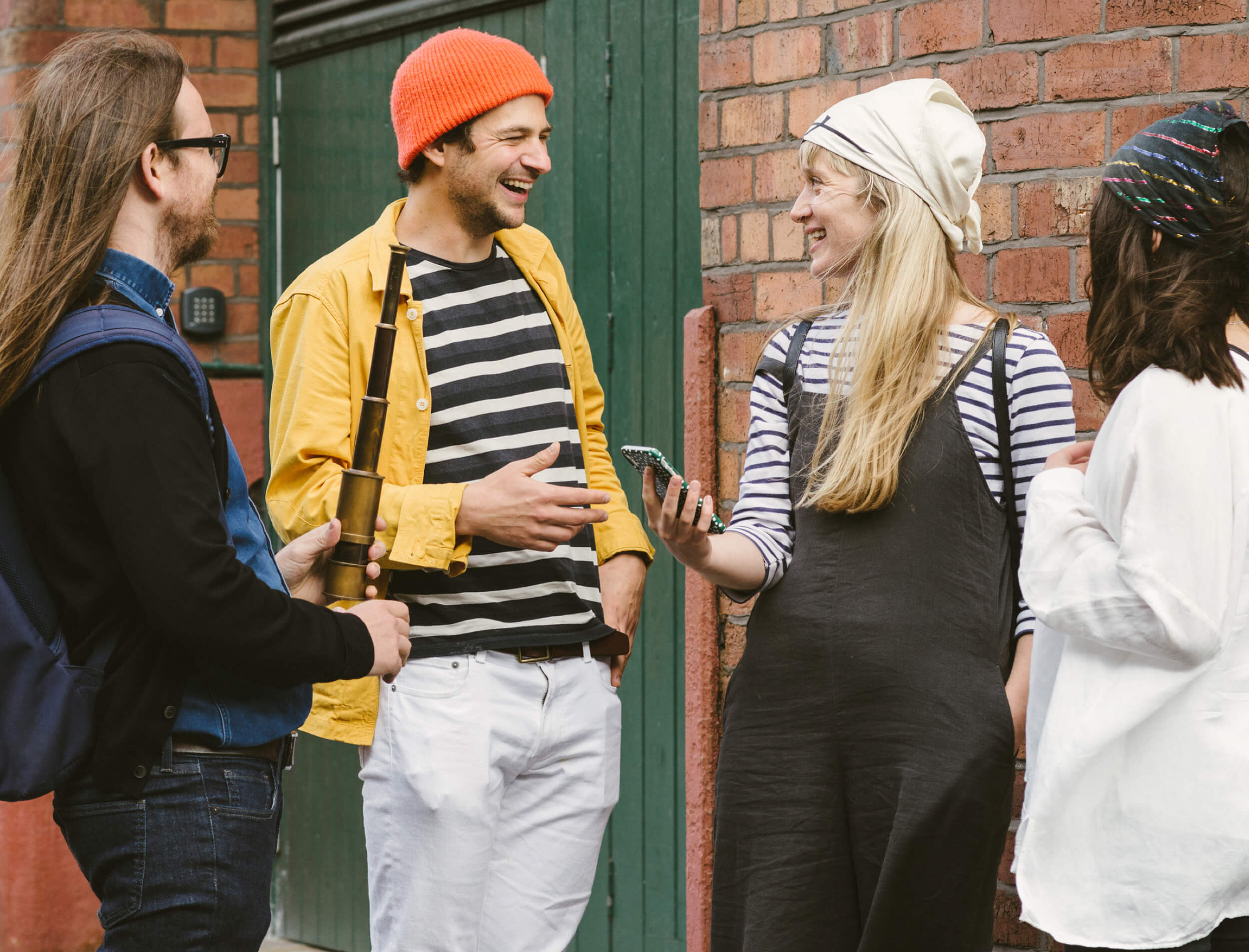 A group of friends exploring tourist attractions on a city treasure hunt